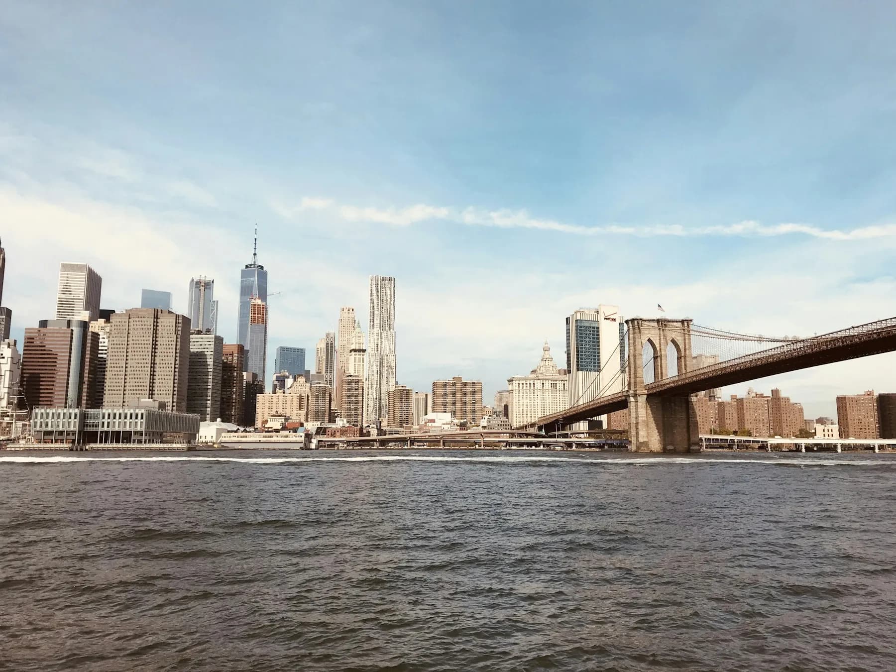 Lower Manhattan skyline and Brooklyn Bridge across the East River
